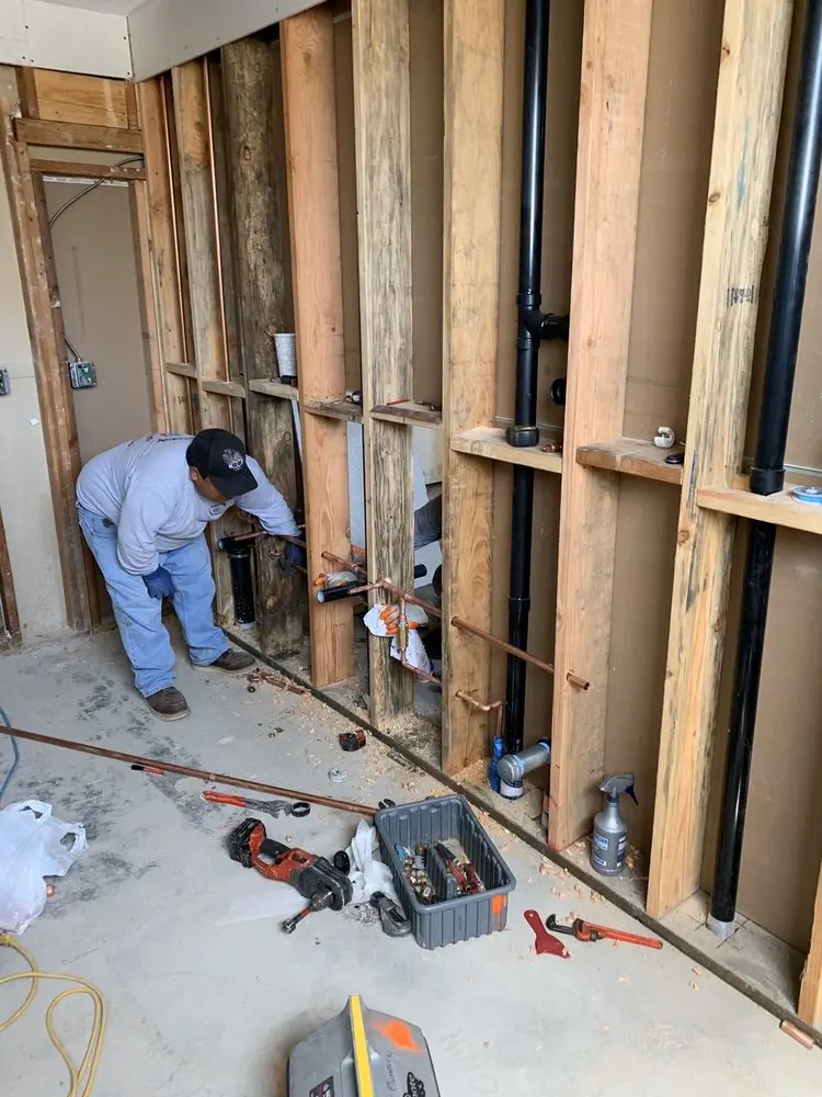 Commercial rough-in plumbing for Water Heater Replacement in Hyde Park